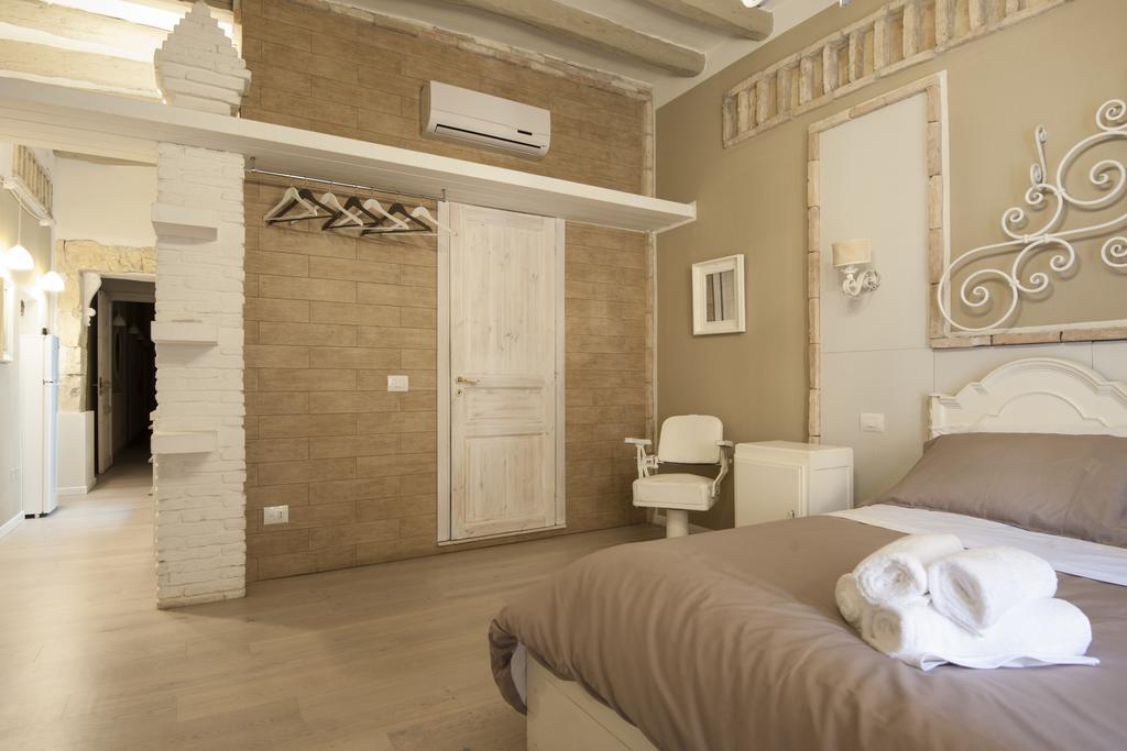 Cento Suites Cagliari Pokoj fotografie